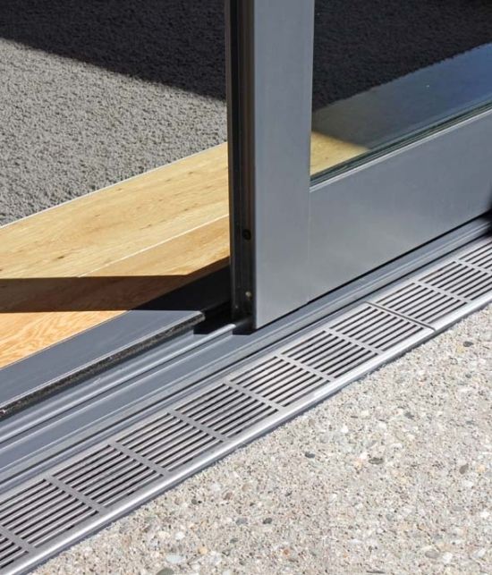 Low or flush threshold for bifolding or sliding doors aluhomes LImited